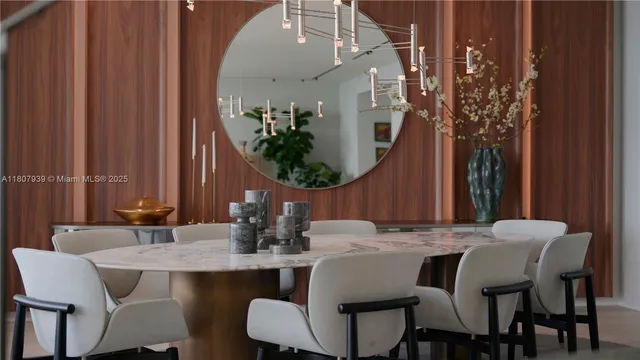 a kitchen with stainless steel appliances granite countertop a refrigerator and a stove