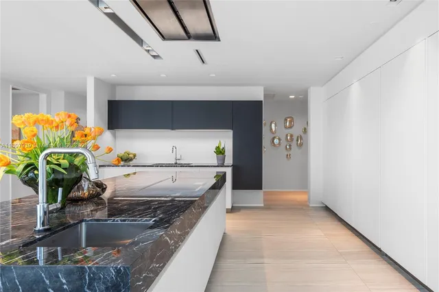 a bathroom with a toilet sink and shower