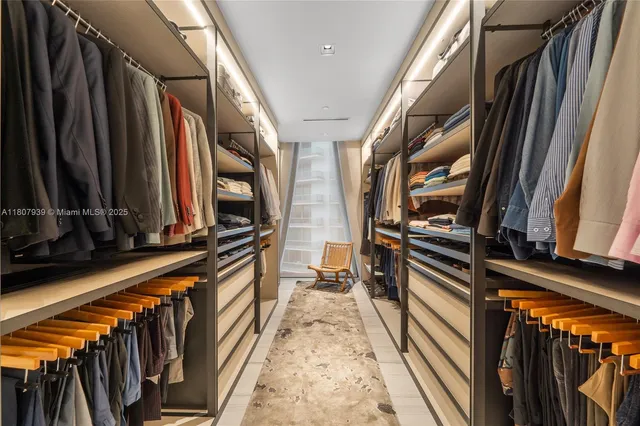 a view of swimming pool with a lounge chair