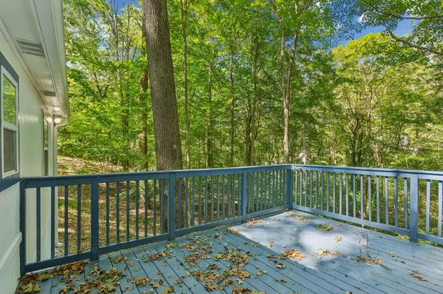 a balcony with wooden floor