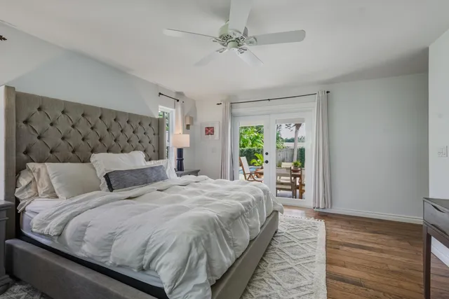 a bedroom with a bed and a table in it