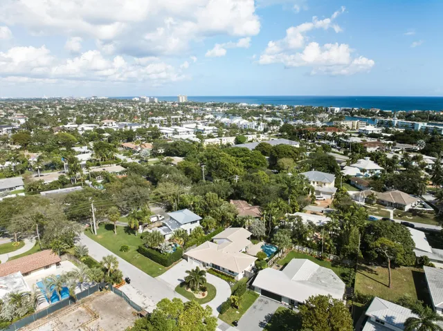 an aerial view of a house with a garden