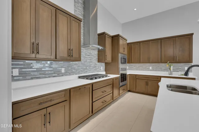 an aerial view of a city with ocean view