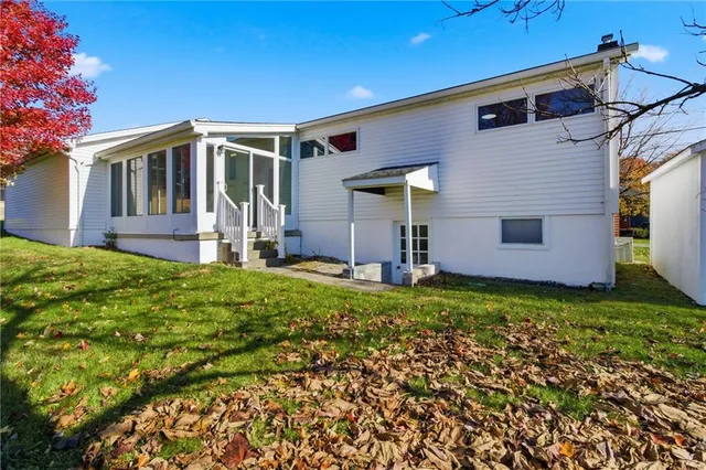a backyard of a house with lots of green space