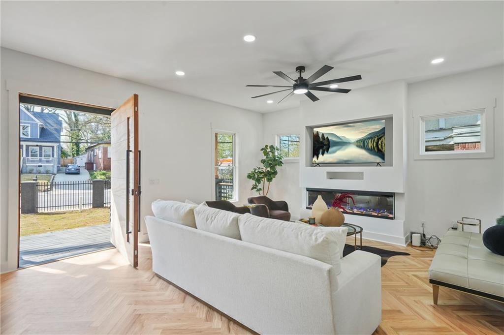 718 Cascade Avenue Southwest Atlanta, GA 30310 - Photo 14 of 37 a living room with furniture and a large window
