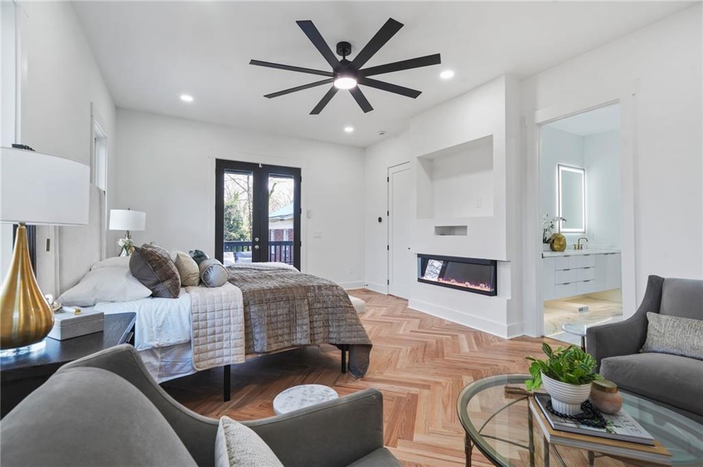 718 Cascade Avenue Southwest Atlanta, GA 30310 - Photo 26 of 37 a living room with furniture ceiling fan and a rug