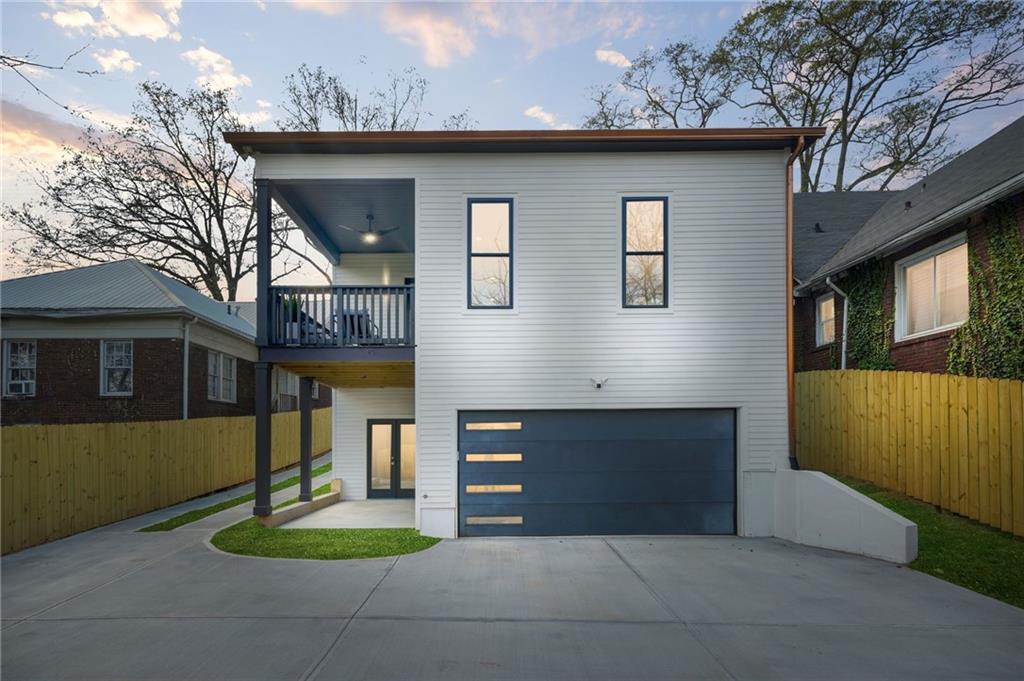 718 Cascade Avenue Southwest Atlanta, GA 30310 - Photo 34 of 37 a front view of a house with a yard