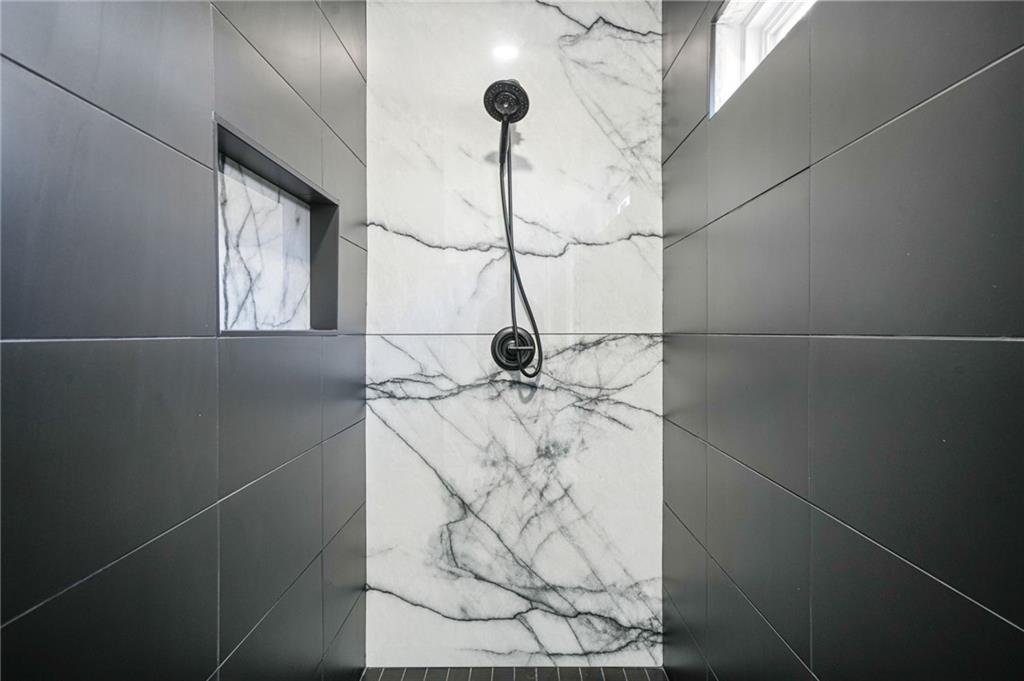 718 Cascade Avenue Southwest Atlanta, GA 30310 - Photo 5 of 37 a bathroom with a shower