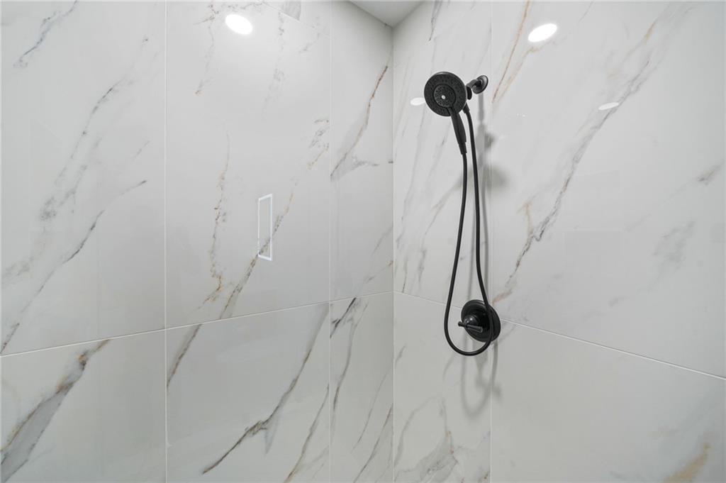 718 Cascade Avenue Southwest Atlanta, GA 30310 - Photo 10 of 37 a bathroom with a shower