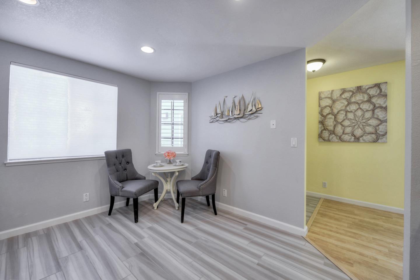 3156 Heather Ridge Drive San Jose, CA 95136 - Photo 12 of 29 a view of a livingroom with furniture and wooden floor