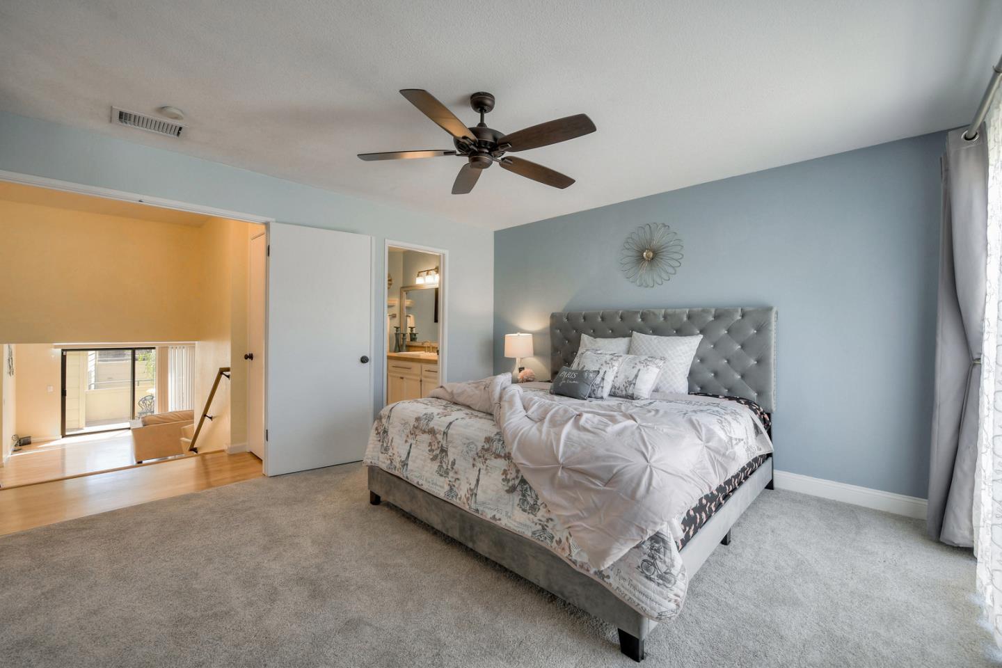 3156 Heather Ridge Drive San Jose, CA 95136 - Photo 20 of 29 a bedroom with a bed and window