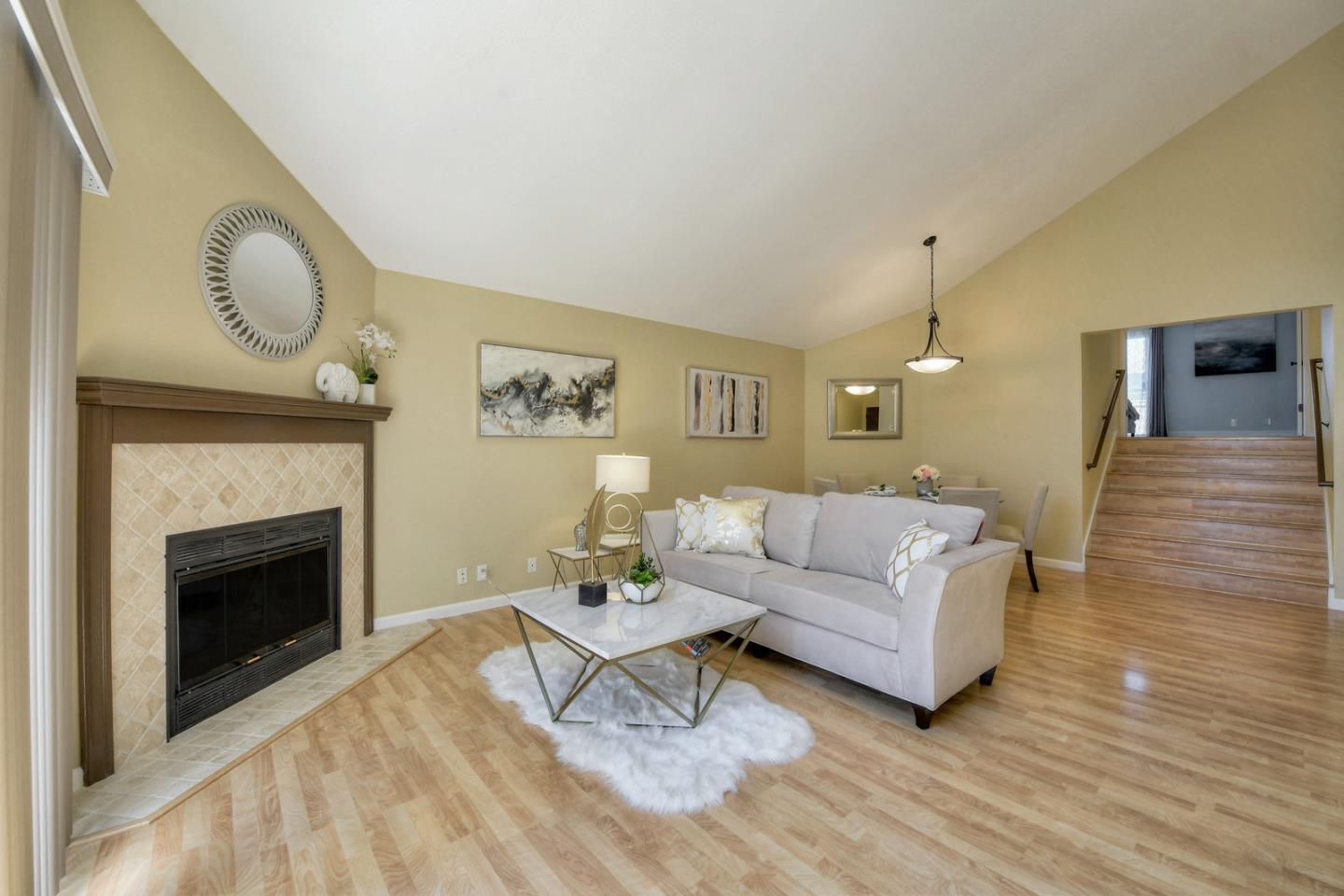 3156 Heather Ridge Drive San Jose, CA 95136 - Photo 8 of 29 a living room with furniture and a fireplace