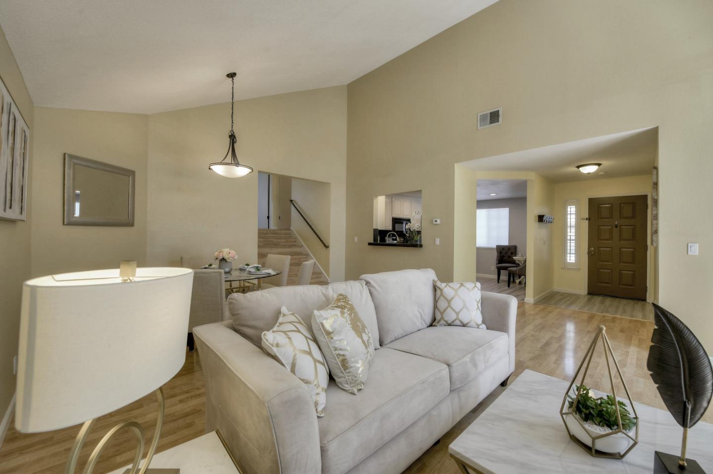 3156 Heather Ridge Drive San Jose, CA 95136 - Photo 9 of 29 a living room with furniture and a table
