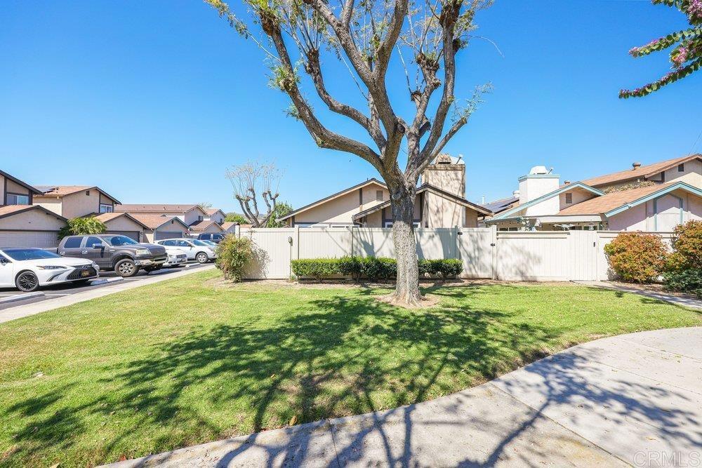 10385 Seth Way Santee, CA 92071 - Photo 4 of 33 a front view of a house with garden