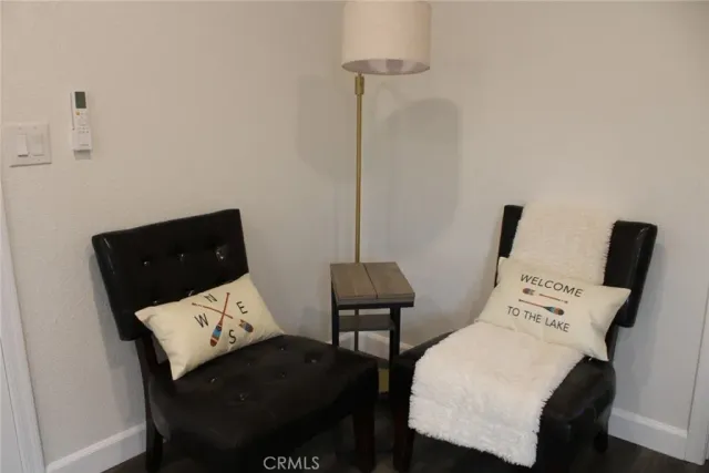 a view of a workspace with furniture