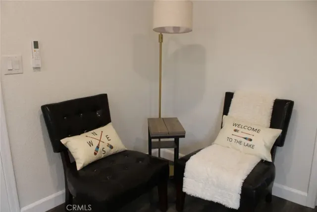 a view of a workspace with furniture