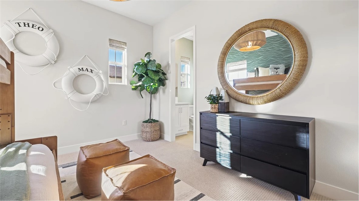 1379 Gavilan Ridge Rancho Mission Viejo, CA 92694 - Photo 15 of 27 a living room with furniture a mirror and a fireplace