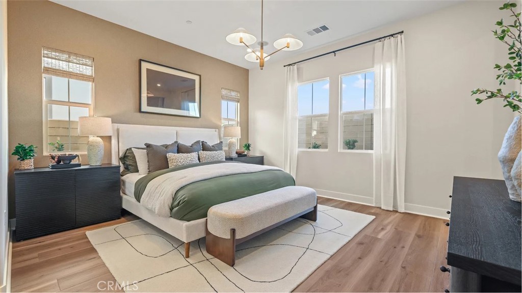 1379 Gavilan Ridge Rancho Mission Viejo, CA 92694 - Photo 9 of 27 a bedroom with a bed mirror and window