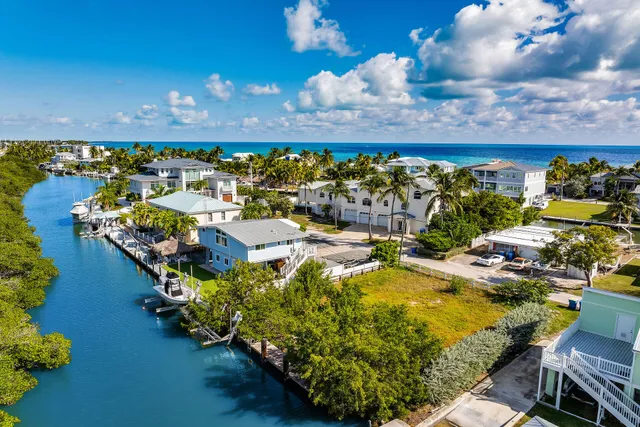 an aerial view of a houses with outdoor space