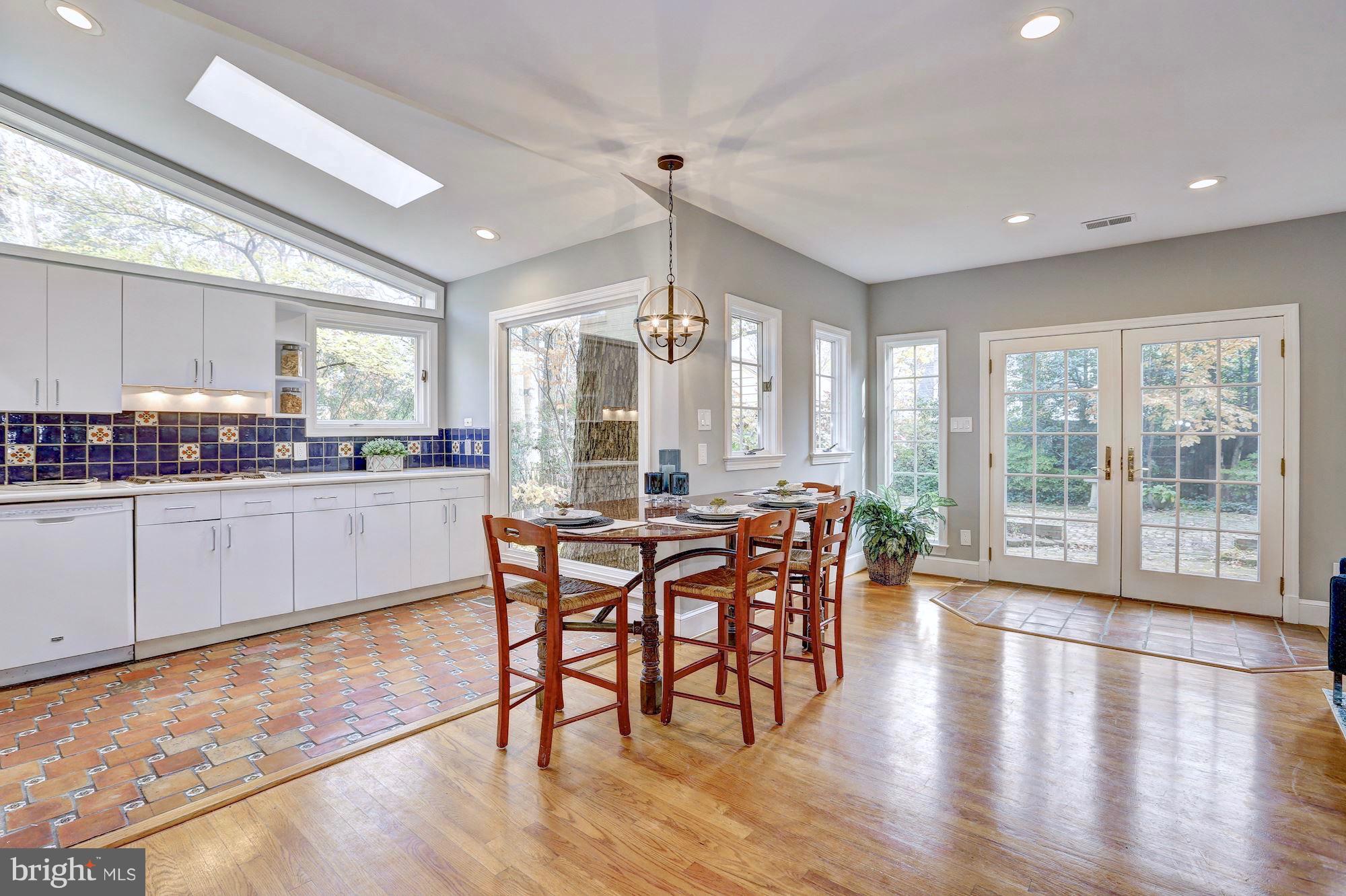 6613 32nd Street Northwest Washington, DC 20015 - Photo 16 of 47 Custom granite kitchen table that seats five