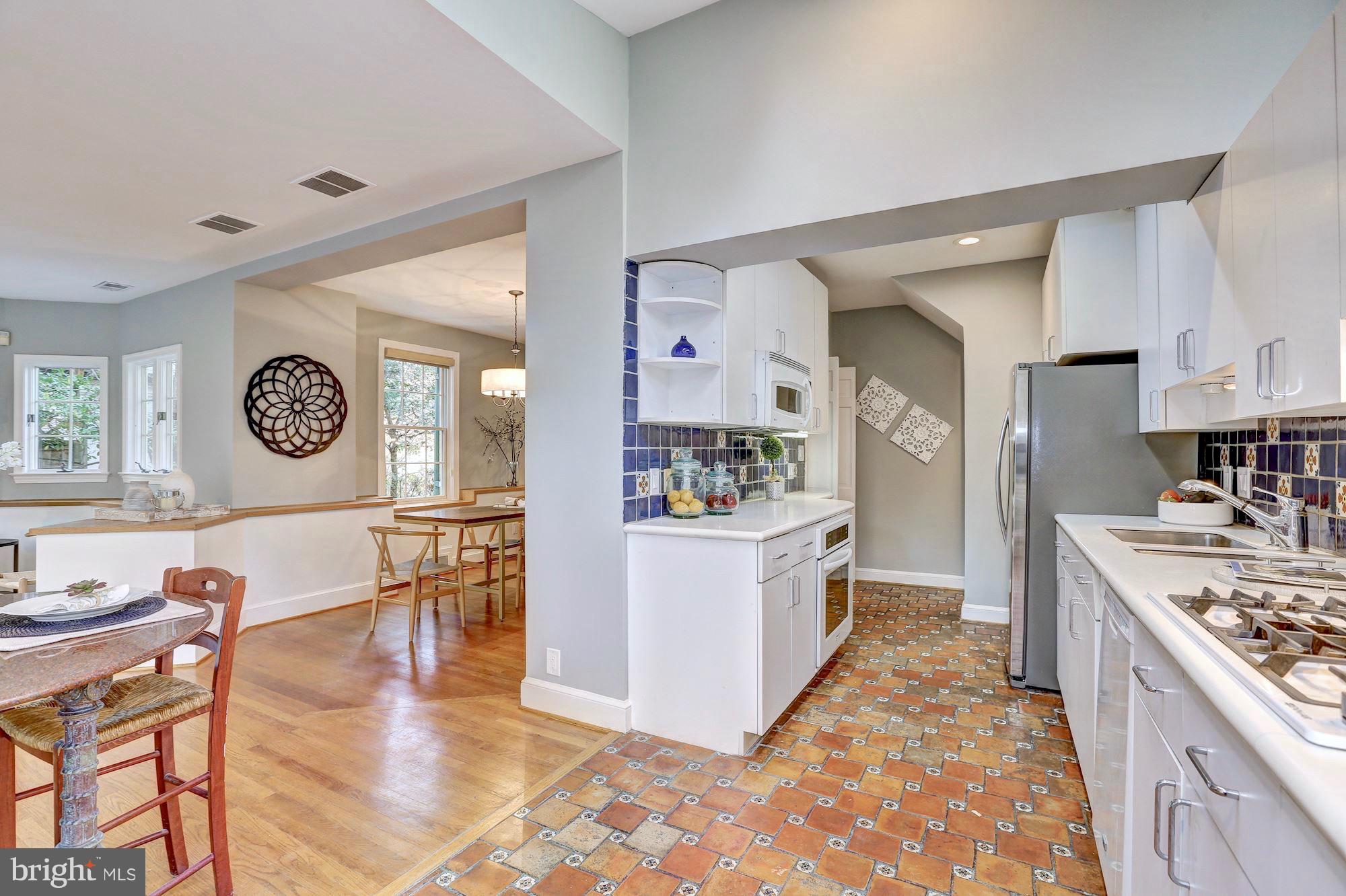 6613 32nd Street Northwest Washington, DC 20015 - Photo 17 of 47 White kitchen with high ceilings.