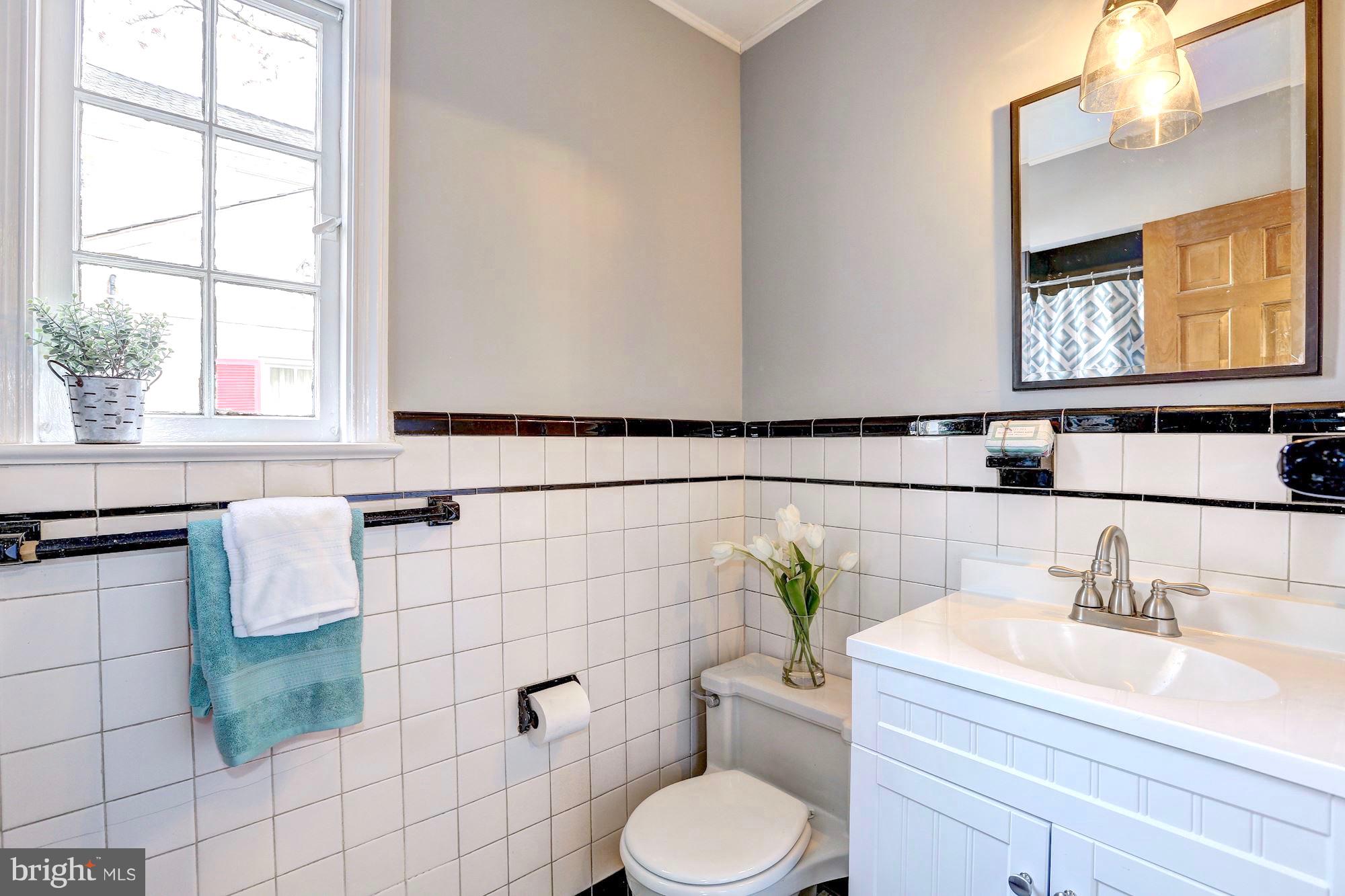 6613 32nd Street Northwest Washington, DC 20015 - Photo 23 of 47 Main floor full bath w/ new vanity