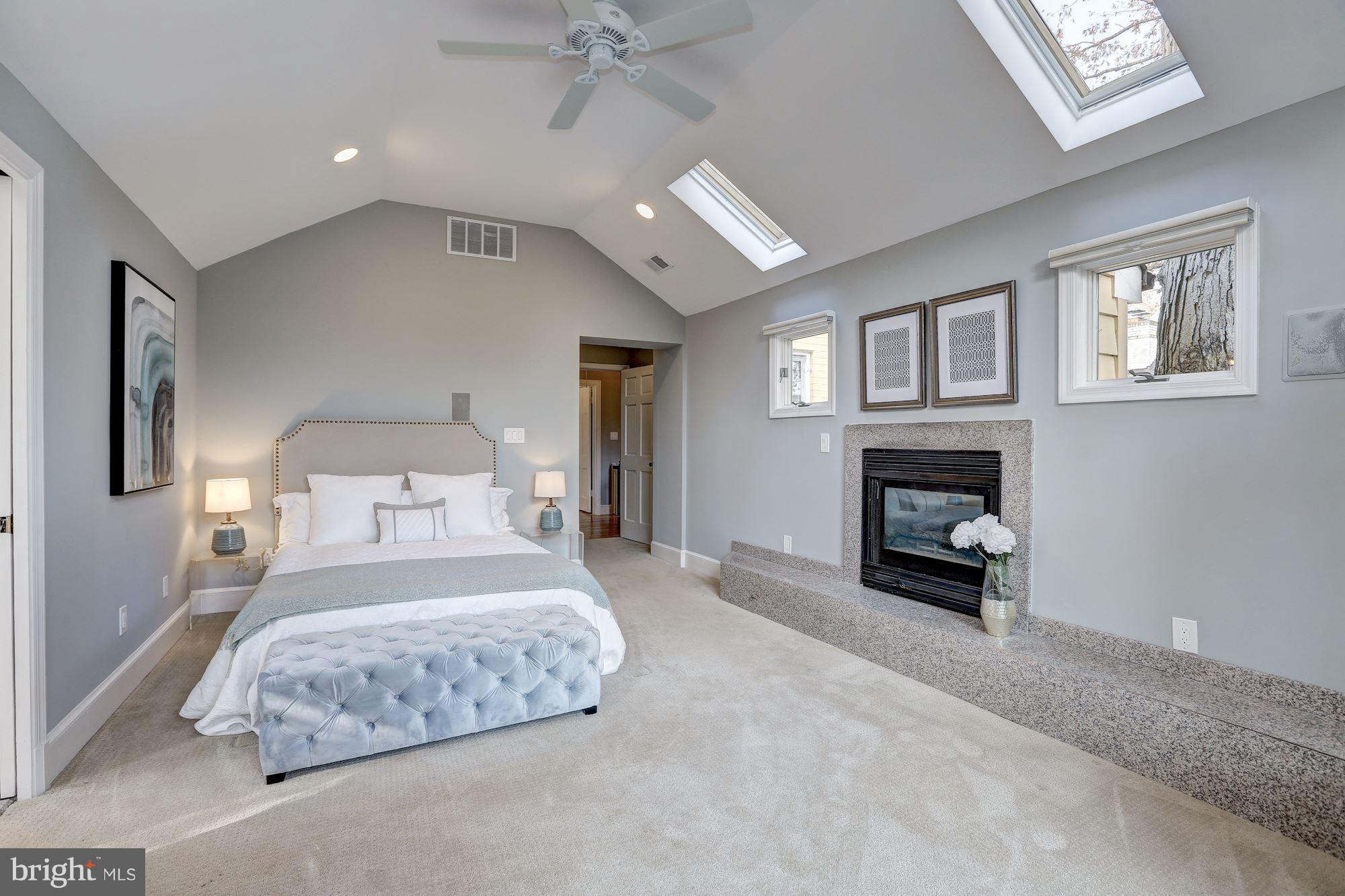 6613 32nd Street Northwest Washington, DC 20015 - Photo 34 of 47 The gas fireplace & carpet create a cozy ambience