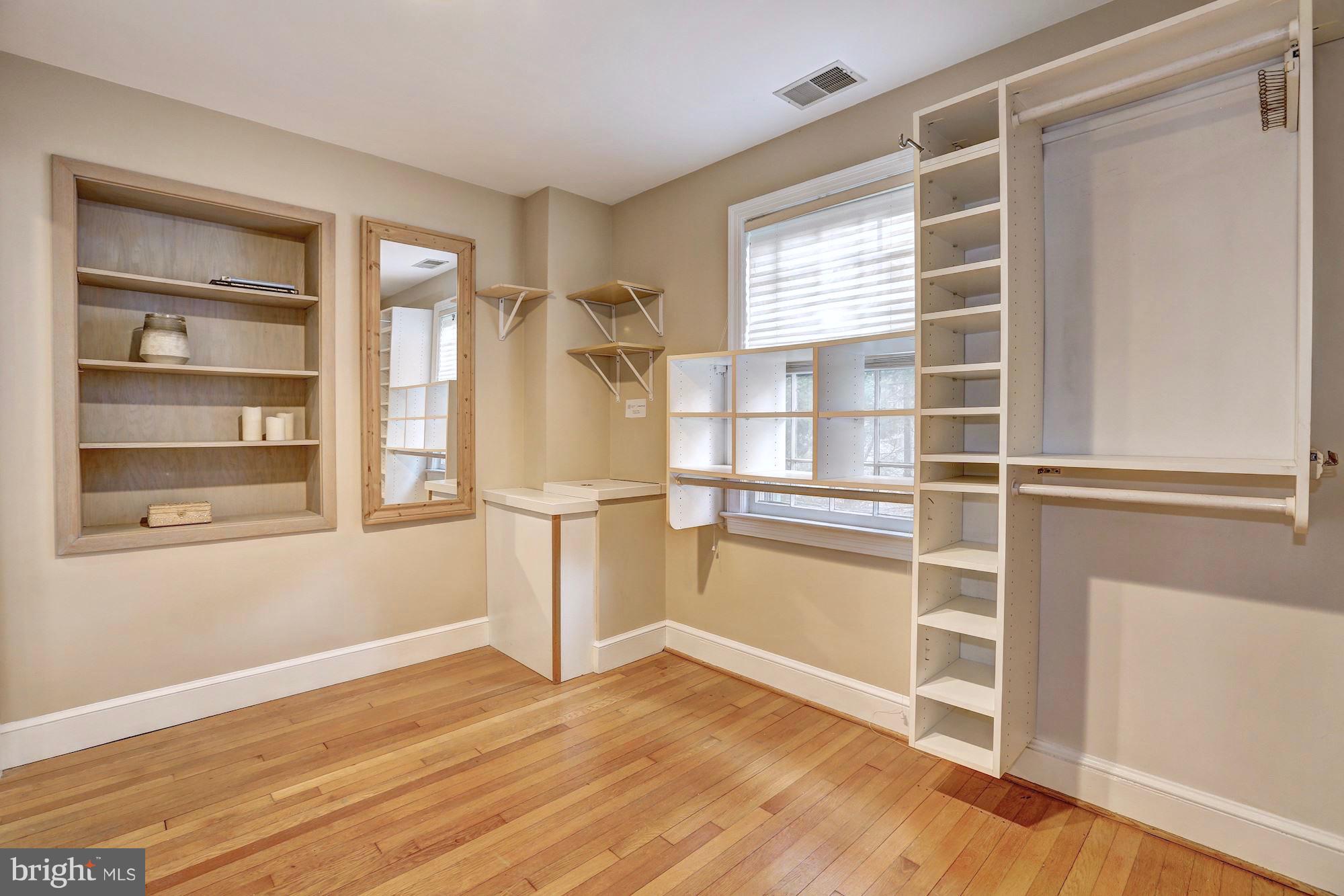6613 32nd Street Northwest Washington, DC 20015 - Photo 38 of 47 Huge custom closet off the master w/ laundry chute