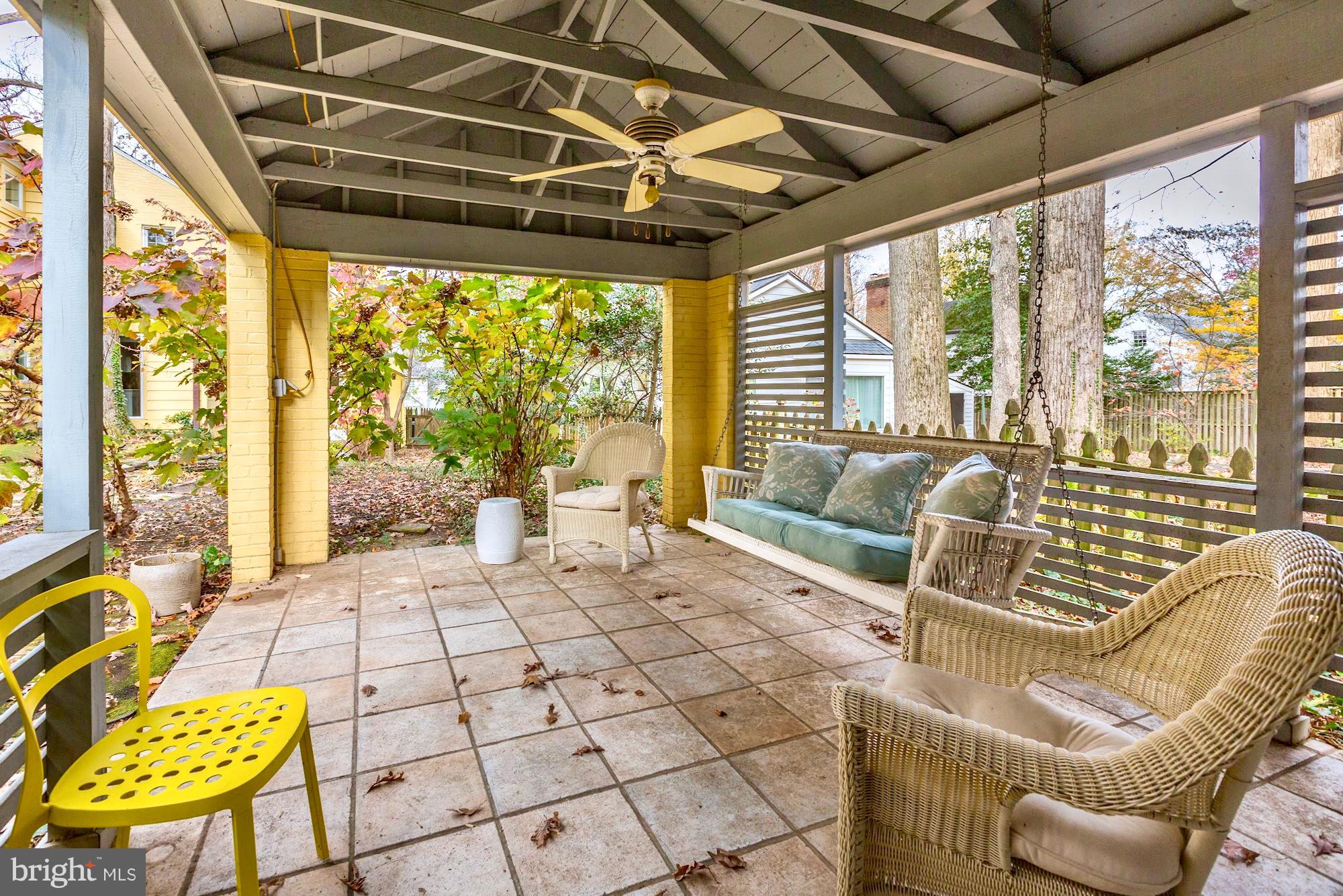 6613 32nd Street Northwest Washington, DC 20015 - Photo 45 of 47 Seating and storage in the attached potting shed.