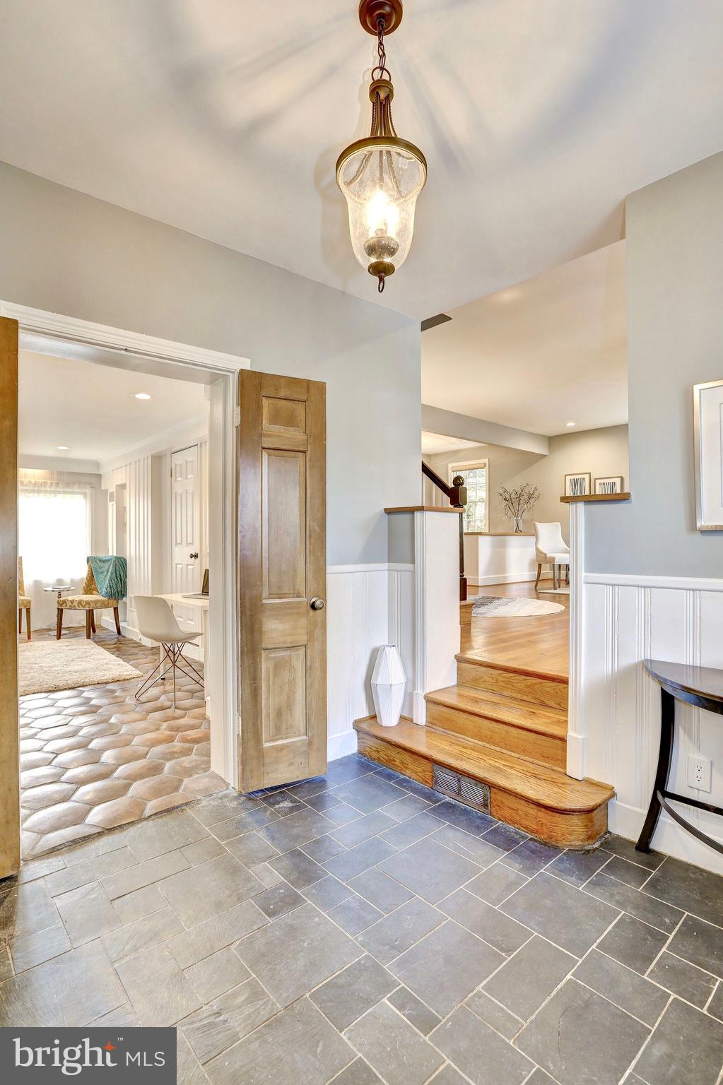 6613 32nd Street Northwest Washington, DC 20015 - Photo 6 of 47 Original solid wood doors & classic light fixture
