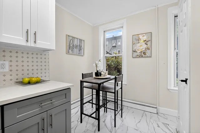 a view of a table and chair in a kitchen