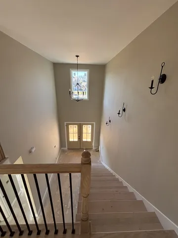 a view of a hallway with a window