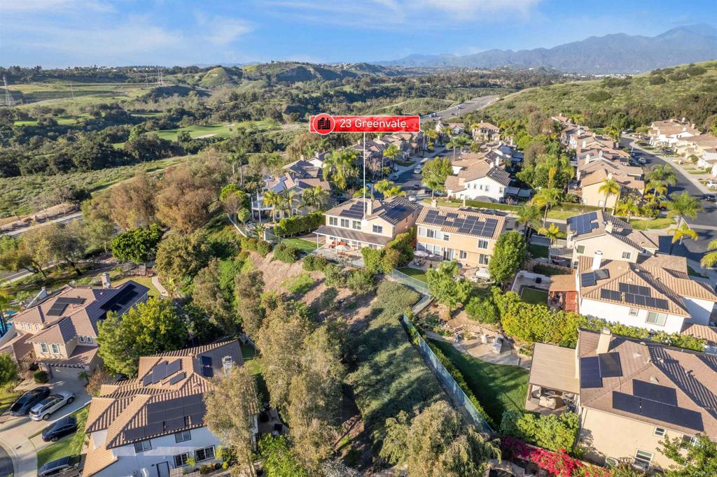 23 Greenvale Rancho Santa Margarita, CA 92688 - Photo 1 of 1 an aerial view of residential houses with outdoor space and trees