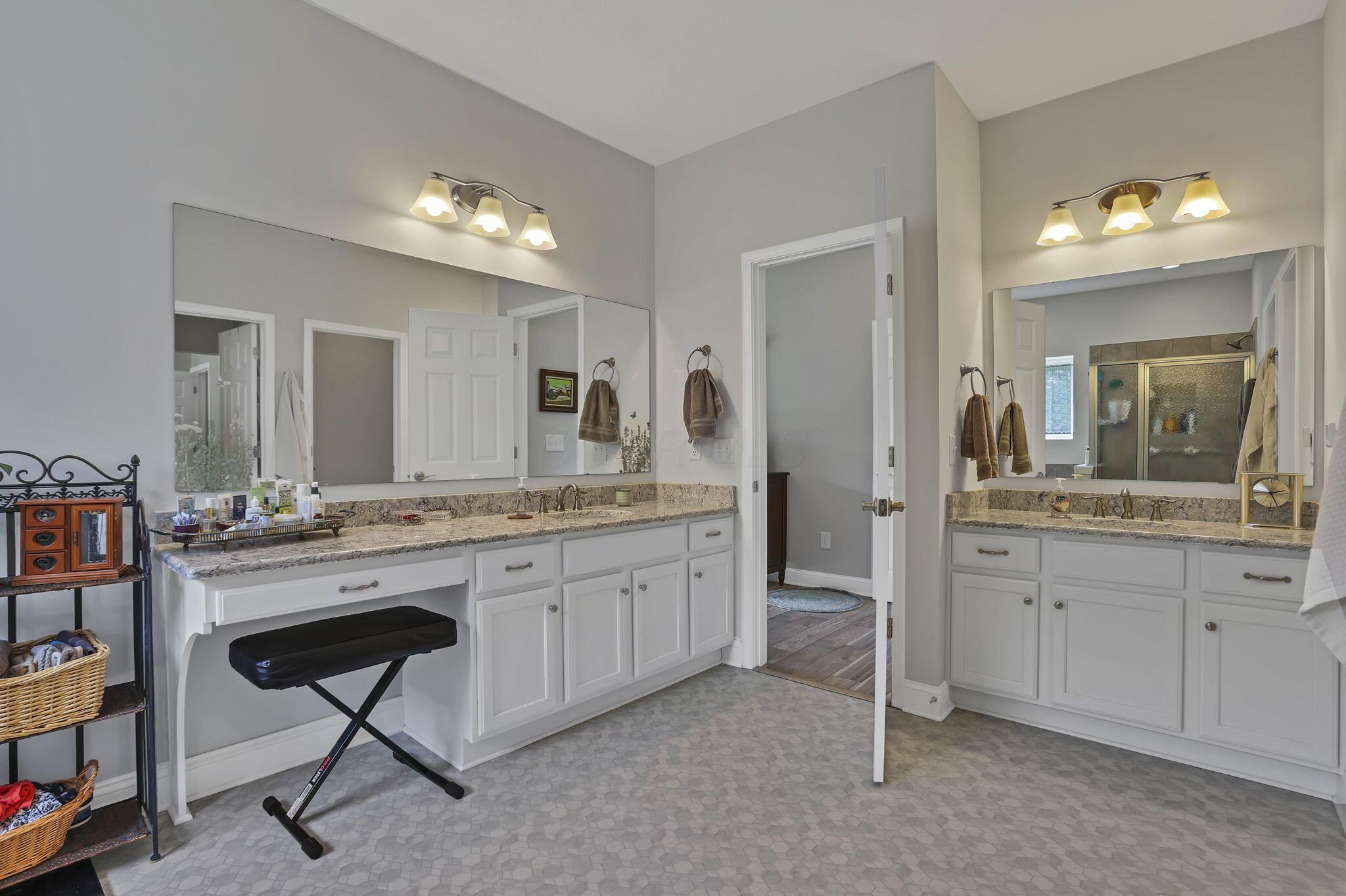 9660 Old Rainer Road Roseville, OH 43777 - Photo 41 of 71 Owner's bath w his and hers vanities