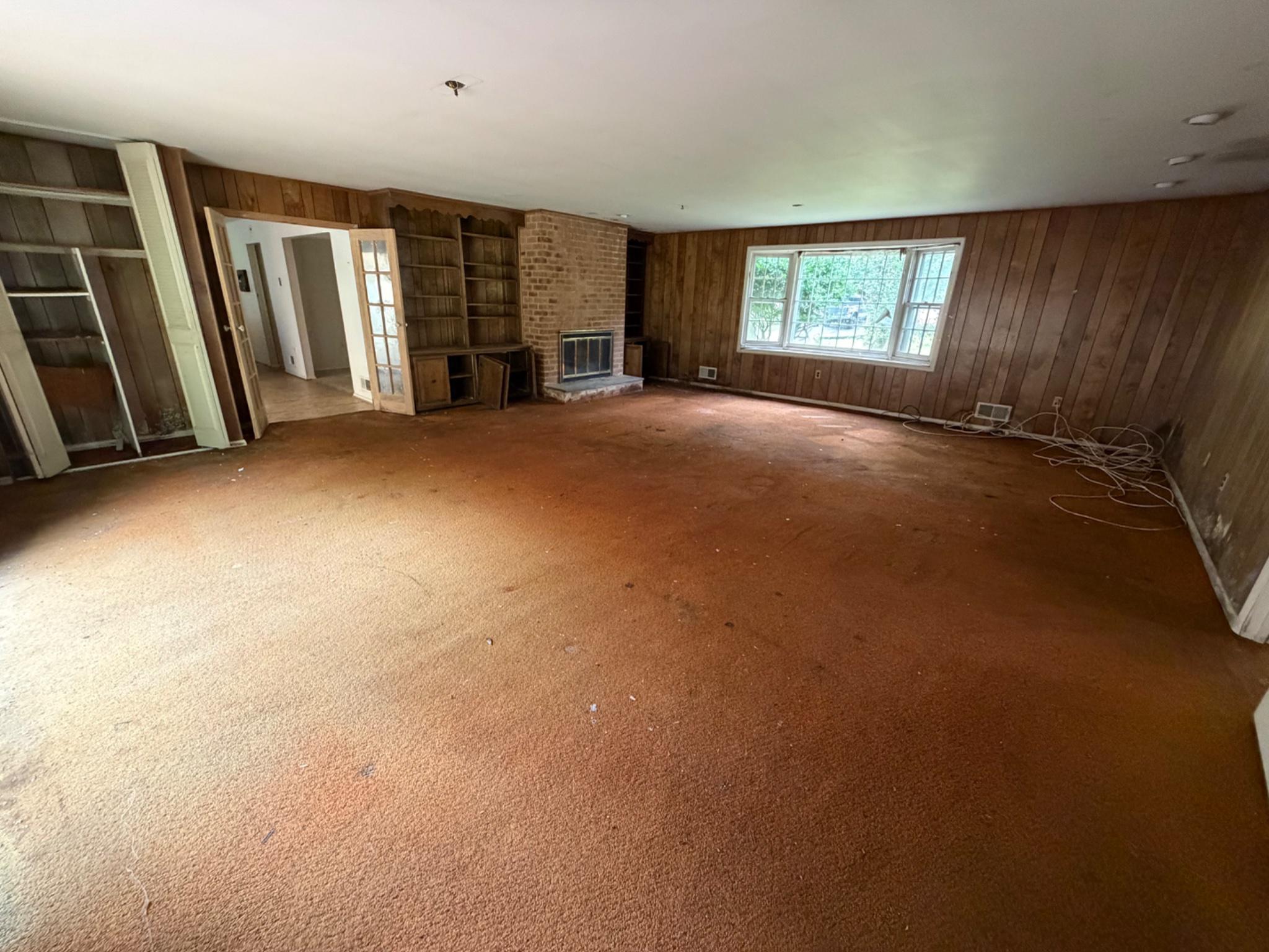 913 Windmill Lane Silver Spring, MD 20905 - Photo 11 of 19 Spacious room with rustic charm.