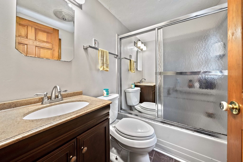 21 Alder Road Holbrook, MA 02343 - Photo 15 of 23 a bathroom with a sink toilet double vanity and shower