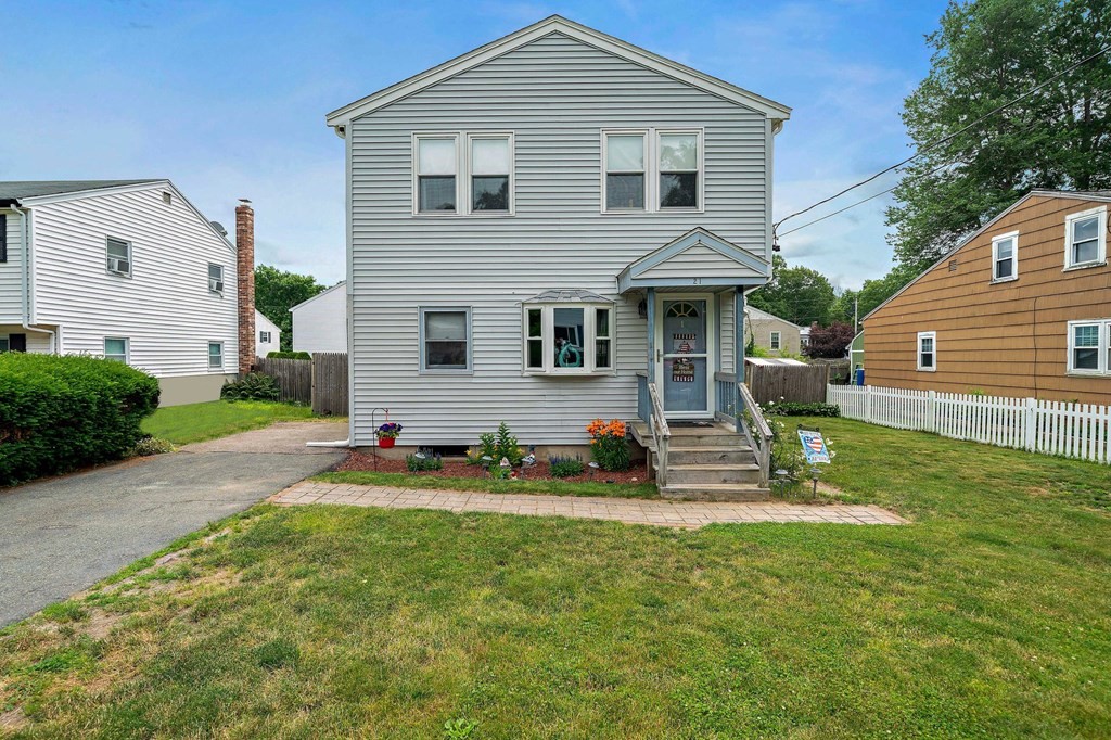 21 Alder Road Holbrook, MA 02343 - Photo 2 of 23 a front view of a house with a yard