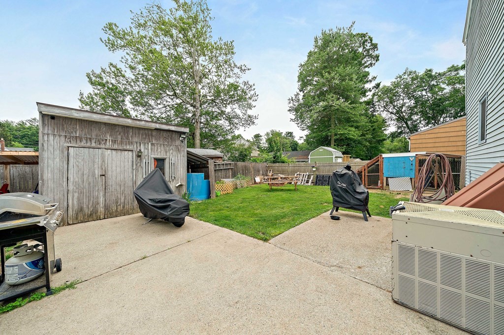 21 Alder Road Holbrook, MA 02343 - Photo 21 of 23 a view of a house with backyard and sitting area