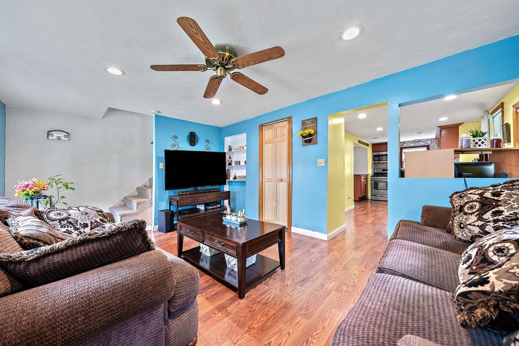 21 Alder Road Holbrook, MA 02343 - Photo 4 of 23 a living room with furniture and a flat screen tv