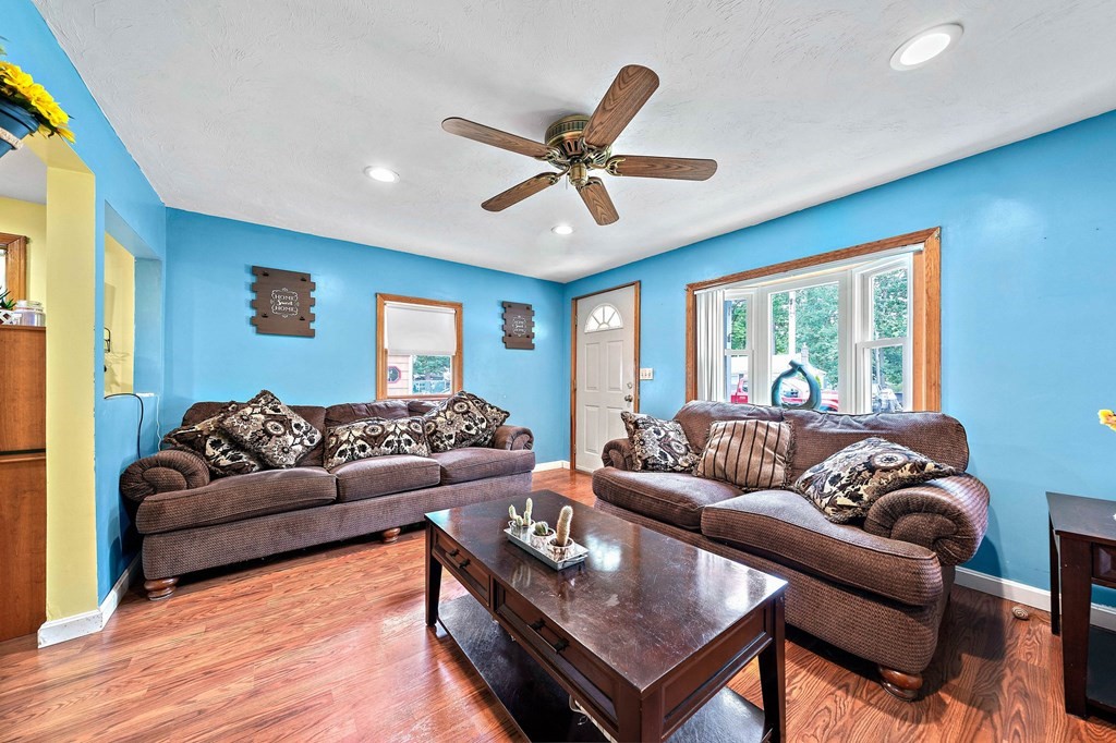 21 Alder Road Holbrook, MA 02343 - Photo 6 of 23 a living room with furniture and a large window
