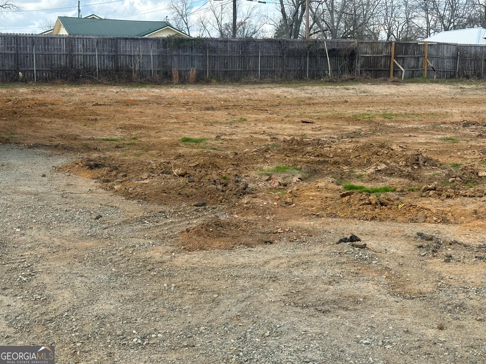 0 Marcus Street Dublin, GA 31021 - Photo 19 of 30 a view of a yard with wooden fence