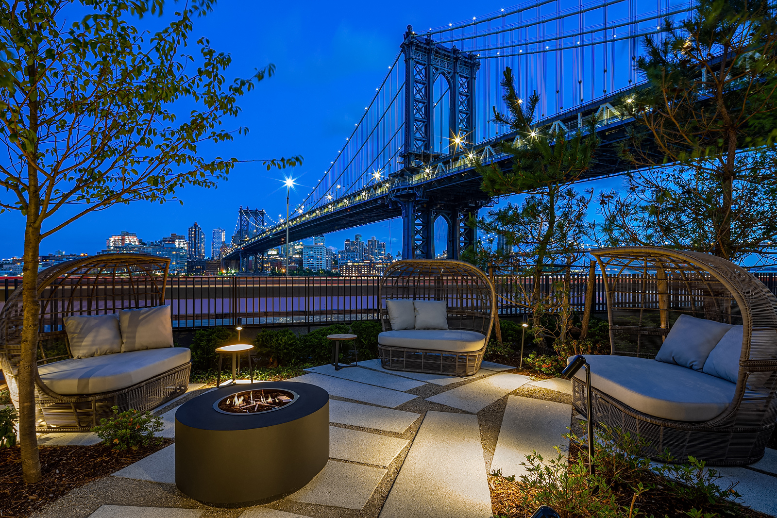 252 South Street, Unit 40G Manhattan, NY 10002 - Photo 17 of 39 a view of a patio with couches chairs and potted plants