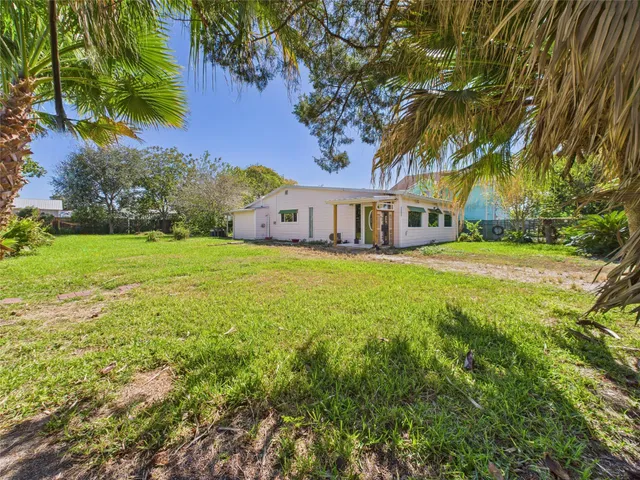 a view of a house with a big yard