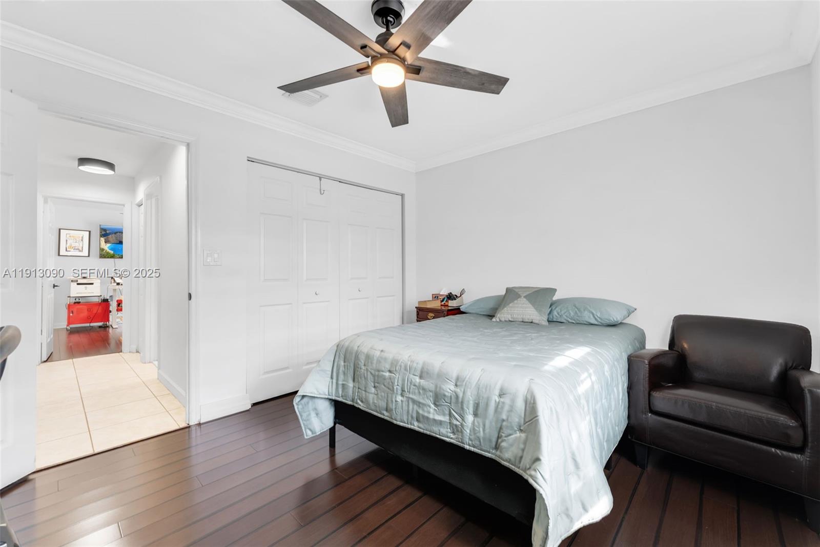 15475 Southwest 138th Terrace Miami, FL 33196 - Photo 17 of 31 a bedroom with a bed and a couch