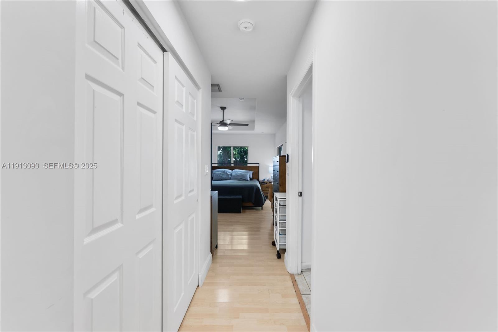 15475 Southwest 138th Terrace Miami, FL 33196 - Photo 19 of 31 a view of a hallway with a livingroom and a hallway