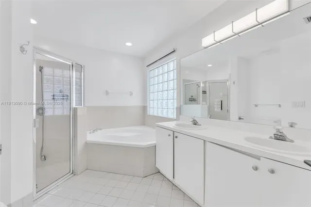a bathroom with a bathtub and a toilet