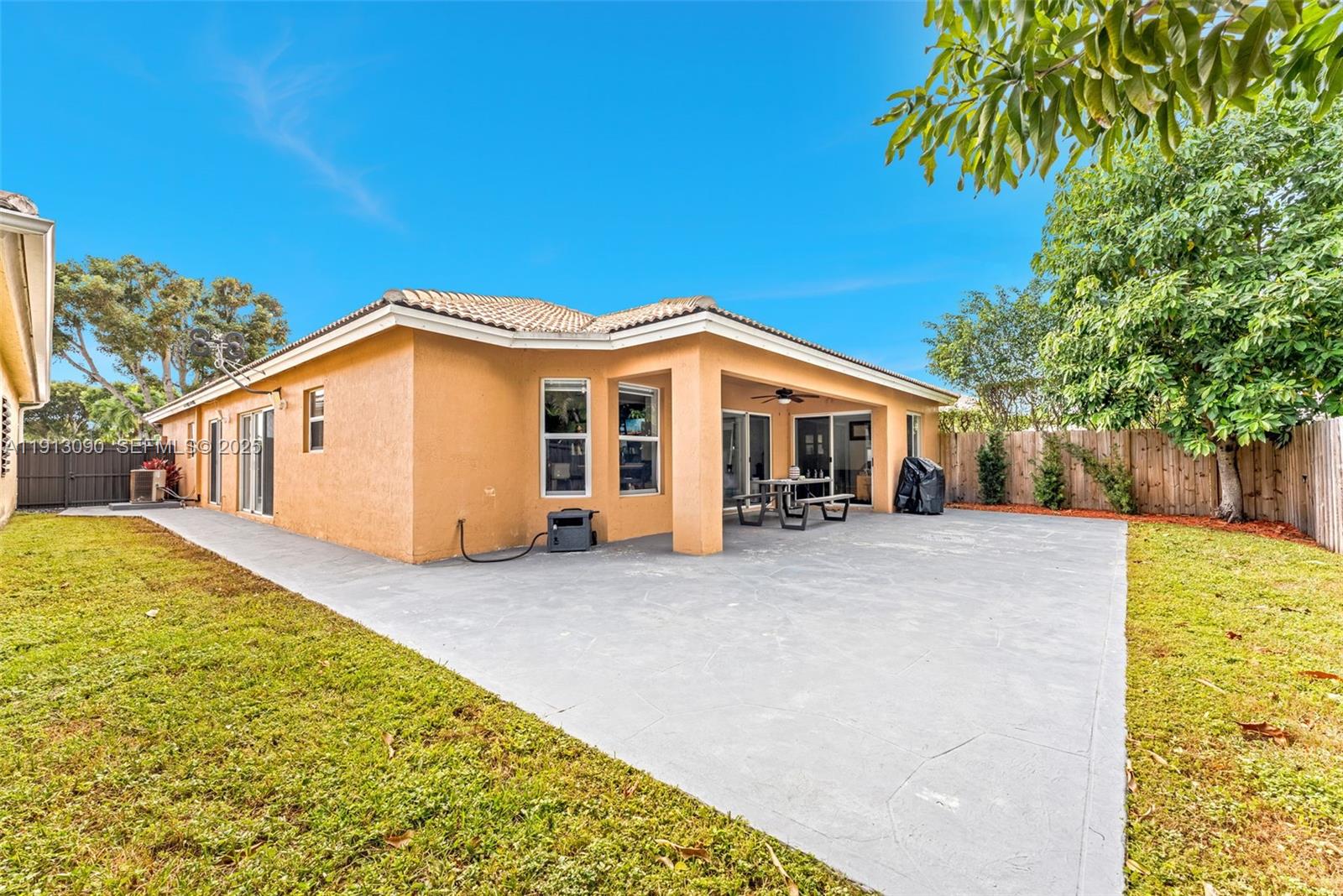 15475 Southwest 138th Terrace Miami, FL 33196 - Photo 27 of 31 a view of a house with a backyard