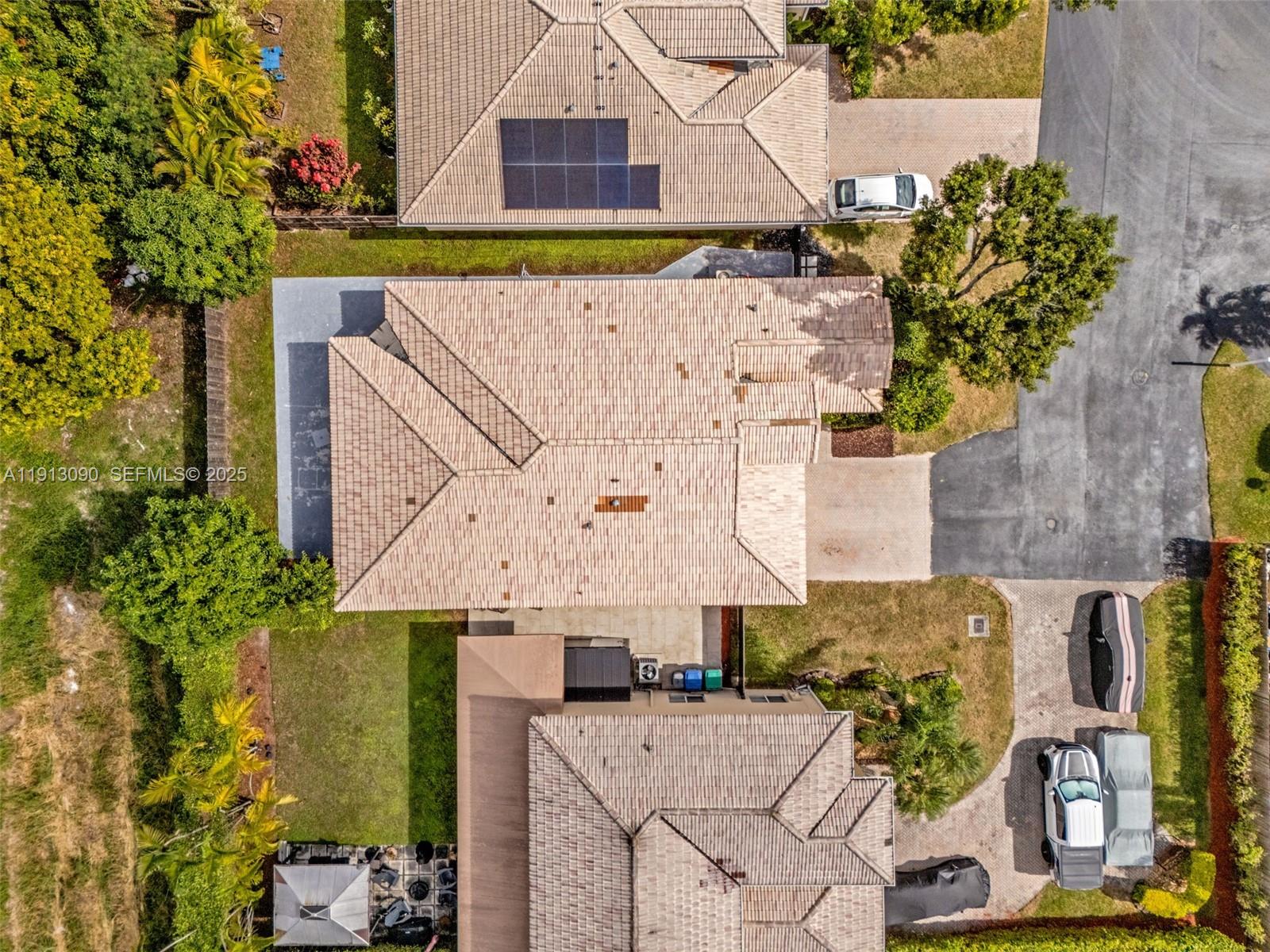 15475 Southwest 138th Terrace Miami, FL 33196 - Photo 30 of 31 an aerial view of residential houses with outdoor space
