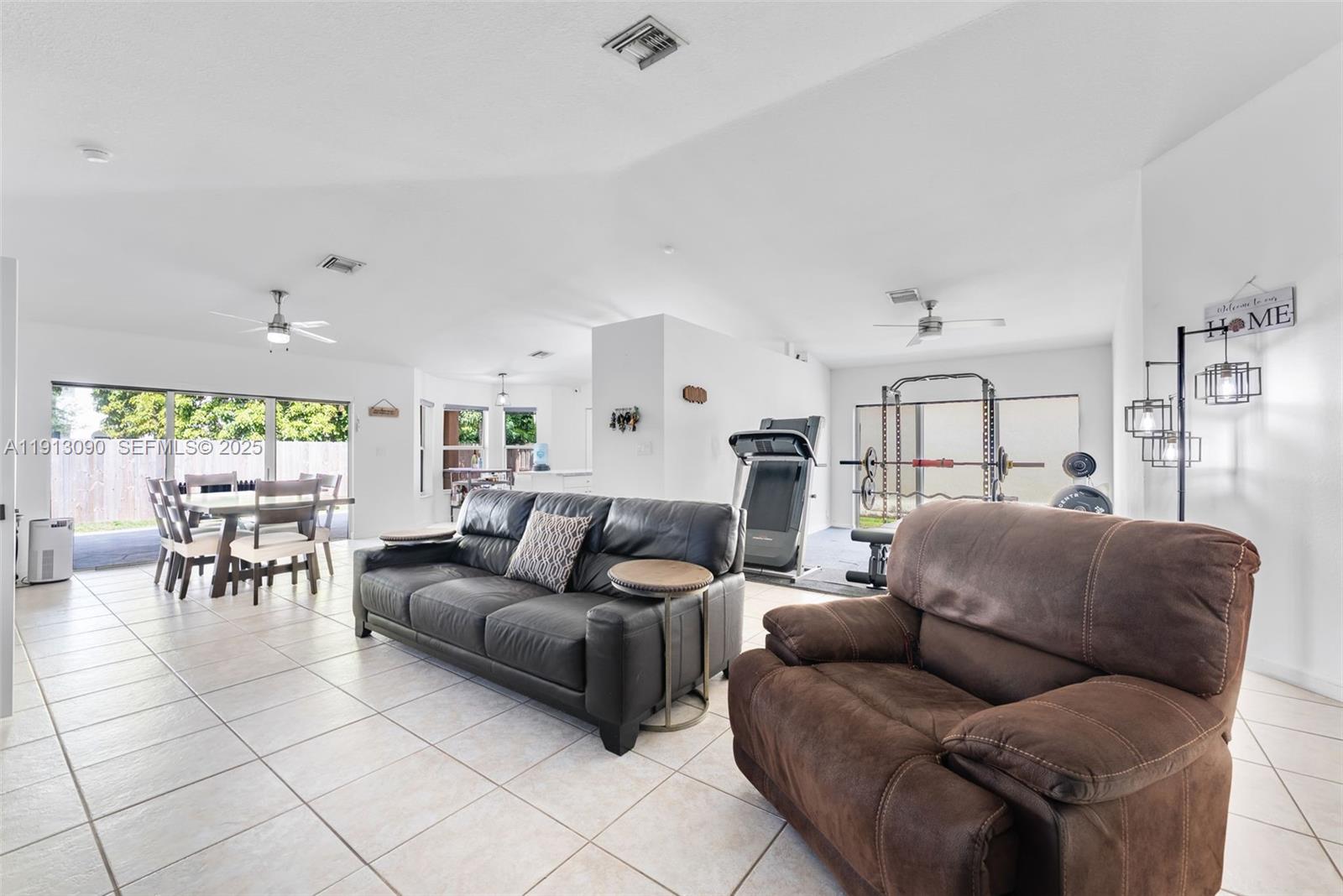 15475 Southwest 138th Terrace Miami, FL 33196 - Photo 8 of 31 a living room with furniture