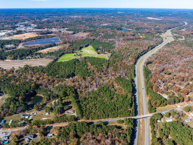 a view of a golf course with a lake